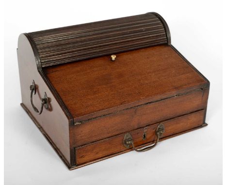 A 19th Century mahogany writing slope, the tambour top opening to reveal inkwell apertures, the fall front with leather writi
