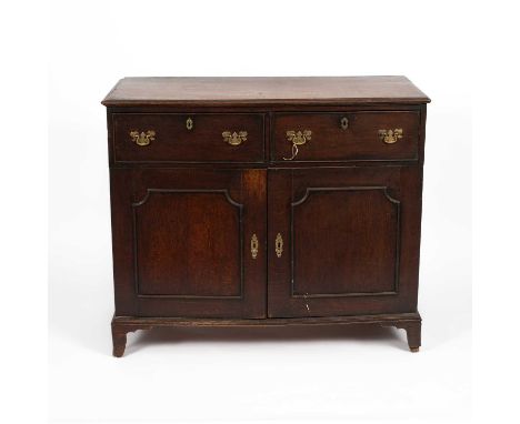 A George III oak dresser base, fitted with two drawers above cupboard doors on bracket feet, 113.5cm wide, 50cm deep, 96cm hi