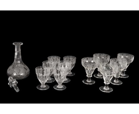 A set of six clear glass rummers engraved with vines to panel moulded tapering bowls, a set of five goblets with pan-topped b