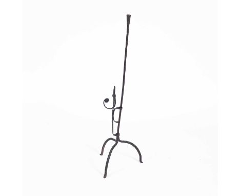 An 18th Century adjustable iron rush light and candle holder on a tripod base, 88cm high