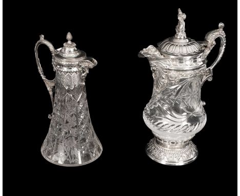 A silver plate mounted claret jug, the hinged cover with Bacchante finial, the glass body of baluster shape with cut decorati