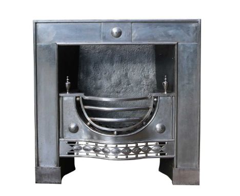 An 18th Century style burnished steel fire grate, the frieze centred by a raised circular boss, the grate with serpentine fro