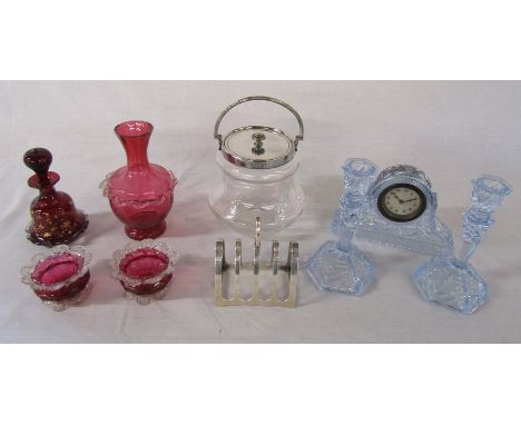 Selection of glass ware inc silver plated biscuit barrel, clock and candlesticks, cranberry glass and silver plated toast rac