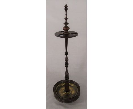 Early 19th century mahogany treen church warden pipe stand, turned column and finial, dished base with brass liner, ball feet