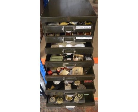 7 drawer cabinet containing watch repairers spares &amp; tools