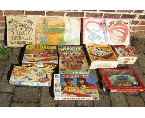 Selection of vintage board games and toys inc gunfight at the o.k corral, big loader, operation, jungle jaws, Matchbox streak