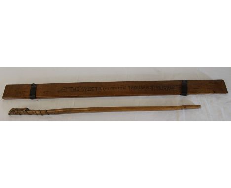 The Avecta patented trouser press / stretcher &amp; a hand carved stick with entwined snake detail
