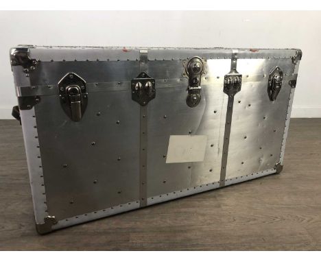 VINTAGE STUDDED CHROME TRAVELLING TRUNK,with twin leather strap handles, 53.5cm high, 102cm wide, 53cm deep