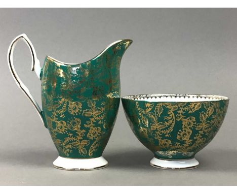 ELIZABETHIAN GILT AND GREEN TEA SERVICE,along with a late Victorian floral decorated part tea service, a ceramic lidded oval 