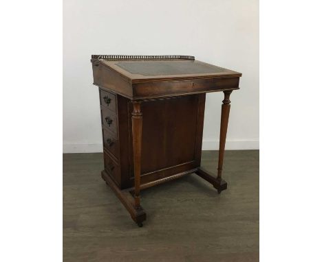 YEW WOOD DAVENPORT,with brass gallery, leather skiver, four side drawers with turned supports, 81cm high, 62cm wide, 54cm dee