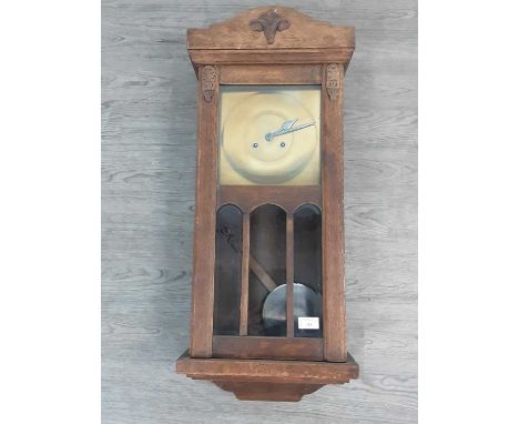 EDWARDIAN OAK CASED WALL CLOCK