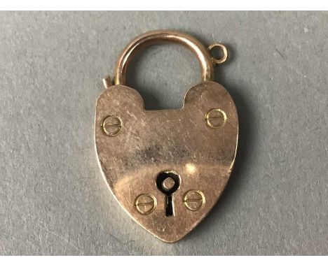 NINE CARAT GOLD PADLOCK CLASP,along with five stick and tie pins