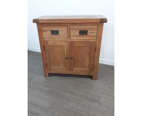 MODERN OAK SIDE CABINET,with two drawers over two doors, 86cm high, 86cm wide, 38cm deepSome water damage to the top otherwis
