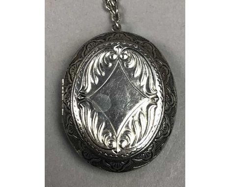 LOT OF SILVER AND WHITE METAL JEWELLERY,including a Victorian oval locket on chain, bracelets and a bangle, also marcasite br