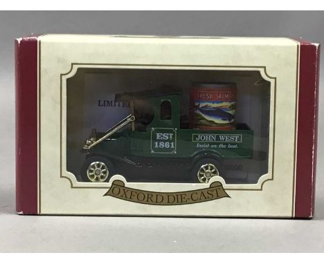 THIRTEEN OXFORD DIE-CAST MODEL VEHICLES,along with a boxed vintage doll