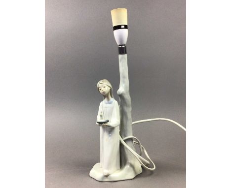 NAO FIGURAL TABLE LAMP,37cm high overall, along with an Lladro swan and three other figures (5)