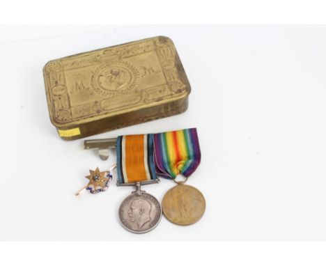 First World War Princess Mary gift tin, together with War and Victory medals, named to 10006 PTE. M. Throp. E. York.R. and a 