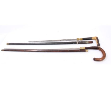 Two late 19th century sword sticks - one with stag horn handle, the other with simulated bamboo handle CONDITION REPORT The b