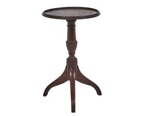 A George IV mahogany tripod table or stand, the moulded top on vase knopped pillar and down curved legs, 61cm h, 38cm diam Co