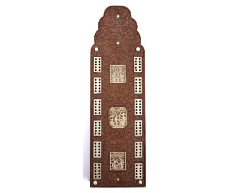 A Chinese sandalwood and ivory cribbage board, mid 19th c, on four paw feet, 24.5cm l Condition ReportOne of the feet damaged