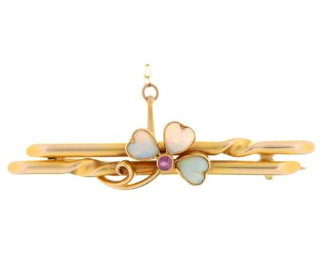 A heart shaped opal and ruby clover leaf bar brooch, c1900, in gold marked 15ct, 45mm, 3.7g Condition ReportGood condition. O