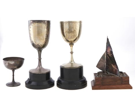 A silver sailing dinghy model racing trophy, set on an oak base, 21cm h, part marked, London, a silver champagne saucer, Birm