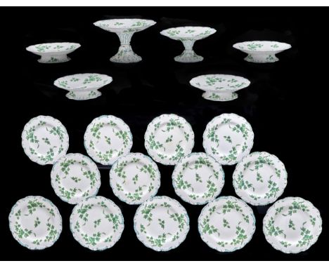 A Minton bone china dessert service, 1850 and 1892, printed and painted in green monochrome with ivy in lightly moulded green