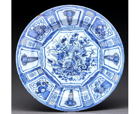 A Dutch Delftware dish, early 18th c, painted in the style of Kraak porcelain, 39cm diam Condition ReportRim chipped at 11 o'