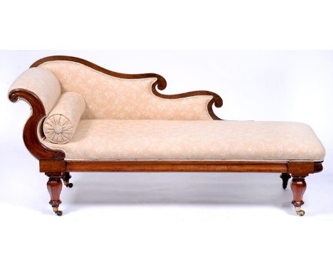 A post Regency rosewood veneered scroll arm couch, c1830, the twin scroll back and moulded scrolling arm above a plain moulde