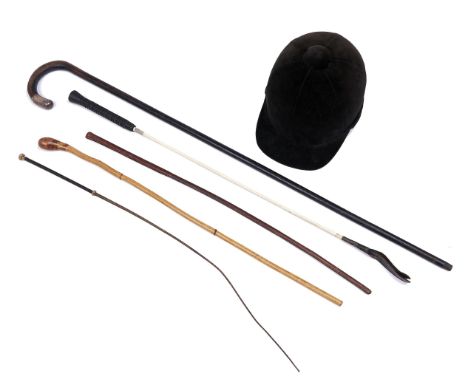 Riding. A Victorian gold mounted lady's whip, another, a stitched leather cane, a bamboo cane and a silver mounted walking st