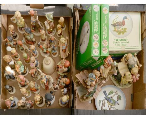 A collection of Goebel pottery figures of children and related subjects, various sizes, printed marks, several boxed Conditio
