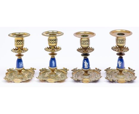 Two pairs of Victorian cast brass mounted jasper ware dwarf candlesticks, c1883, nozzles, 13.5cm h, stamped PODR lozenge mark