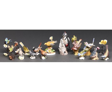 Sixteen Royal Worcester, Crown Staffordshire, Beswick and other pottery and porcelain models of birds and flowers, various si