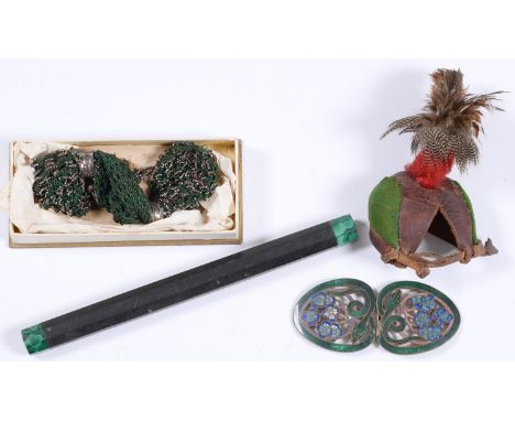 Falconry.&nbsp; A stitched leather red and green velvet and bird's feather hood, early 20th c,  approx 11cm h, a Victorian&nb