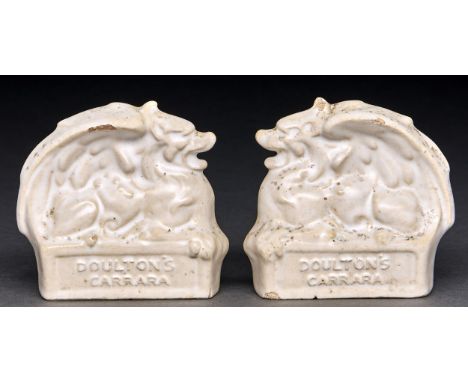 Two Doulton Carrara ware architectural stoneware advertising desk weights, designed by Gilbert Bayes, c1930, 90mm h, impresse