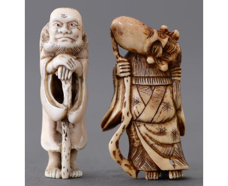 A Japanese ivory netsuke of Jurojin, 19th c, with elongated, tilted head and carrying a staff and another of an immortal wear