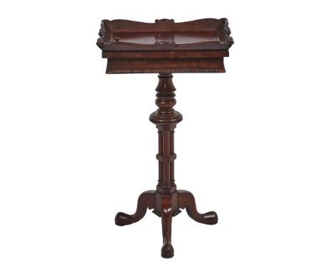 A George IV mahogany flower stand, attributed to Gillows, the rectangular top with flared sides and well, plain frieze with b