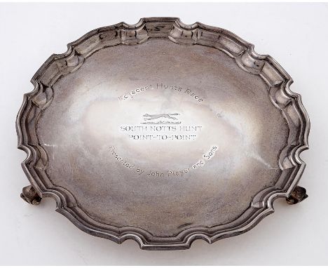 A George V silver waiter, on three volute feet, 20.5cm diam, by William Lister &amp; Sons, Chester 1933, 11ozs 18dwts Conditi
