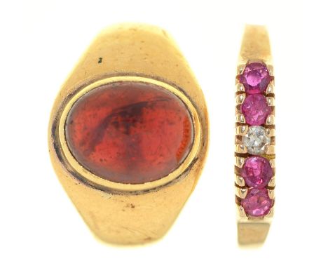 A garnet cabochon ring, in 18ct gold, altered, Chester, part marked, 6.6g, size L and another gem set ring in 9ct gold, 1.5g 