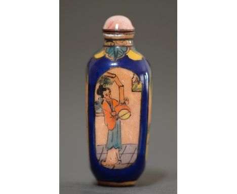 A Chinese enamel snuff bottle, painted with figures reserved on a blue ground, 61mm h, stopper Condition ReportGood condition