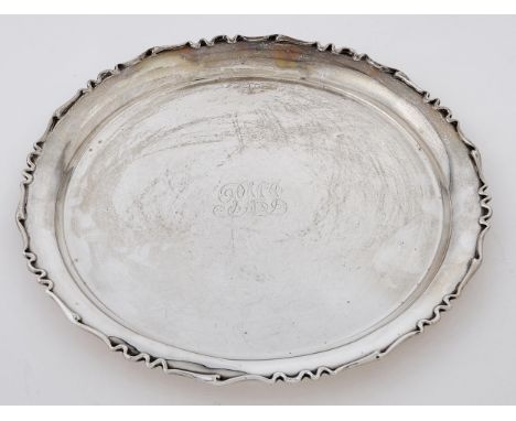 A George V silver salver, 29.5cm diam, marks rubbed, Birmingham 1912, 20ozs 7dwts Condition ReportLight polish scratches