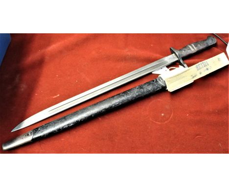 Remington made Pattern 1913 bayonet, with stamps on the ricasso 10/16 (Remington) and on the other side C2 A surmounted by a 