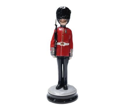 Porcelain figurine produced by the Michael Sutty studio to commemorate the 75th anniversary of the Welsh Guards, 1915–1990. T