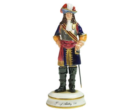 This hand painted and hand modelled figure depicts an artillery officer in 18th-century uniform, standing with one hand on hi