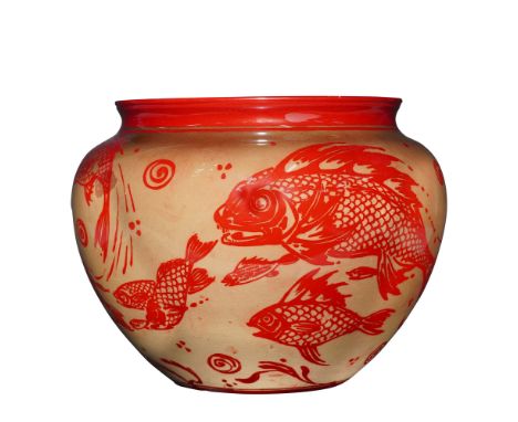 A Bernard Moore flambe pottery vase decorated with an underwater scene. The surface features red fish swimming among stylized
