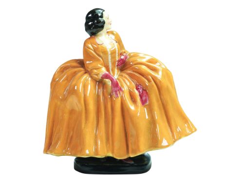 Representing a character from "The Beggar's Opera" this is the third version of the model. The woman is depicted seated in a 