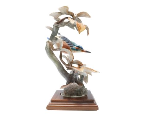 Royal Worcester bone china figurine depicting a Kingfisher in flight among autumn beech branches. Modeled by Dorothy Doughty 