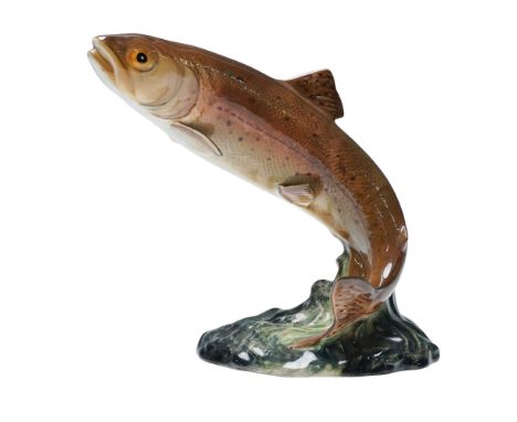 Representing a trout in a dynamic leaping pose with upward-arched body and open mouth. The figure is hand-painted in shades o