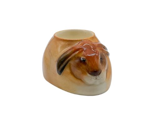 Very rare Royal Doulton Bunnykins egg holder, featuring a hand-painted design of a rabbit head in warm brown and cream tones.