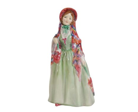 This Royal Doulton figurine captures the charm of a Victorian lady dressed in a flowing green gown with a colorful shawl drap